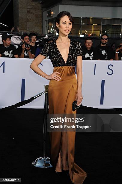 Actress Olga Kurylenko arrives at the premiere of Oblivion held at the Chinese Theater in Hollywood.