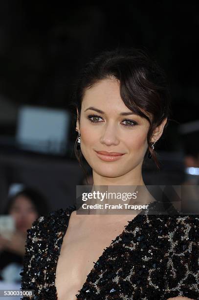 Actress Olga Kurylenko arrives at the premiere of Oblivion held at the Chinese Theater in Hollywood.