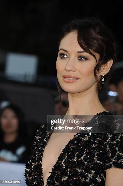 Actress Olga Kurylenko arrives at the premiere of Oblivion held at the Chinese Theater in Hollywood.