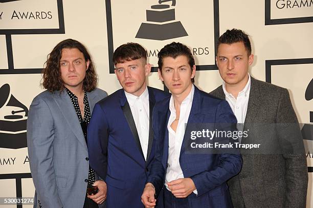 Musicians Nick O'Malley, Jamie Cook, Alex Turner, and Matt Helders of "Arctic Monkeys" arrive at The 57th Annual GRAMMY Awards held at the Staples...