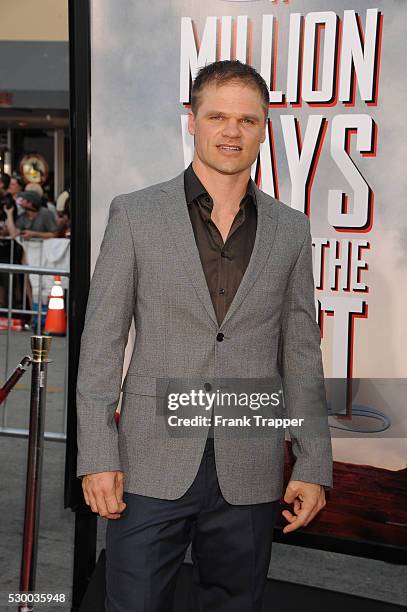 Actor Evan Jones arrives at the premiere of "A Million Ways To Die In The West" held at the Regency Theater in Westwood.