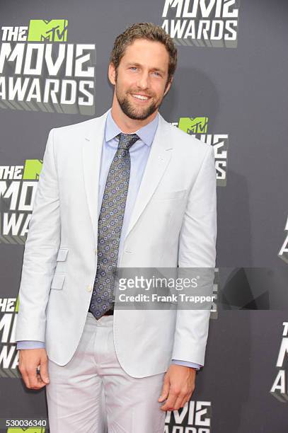 Actor MIke Faiola arrives at the 2013 MTV Movie Awards held at Sony Pictures Studios in Culver City.