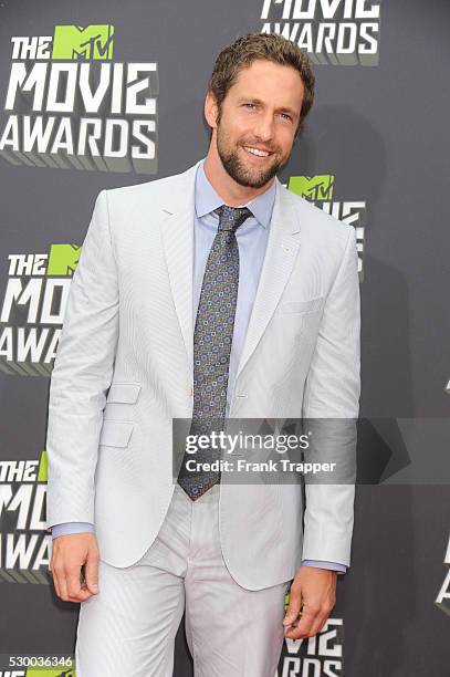 Actor MIke Faiola arrives at the 2013 MTV Movie Awards held at Sony Pictures Studios in Culver City.
