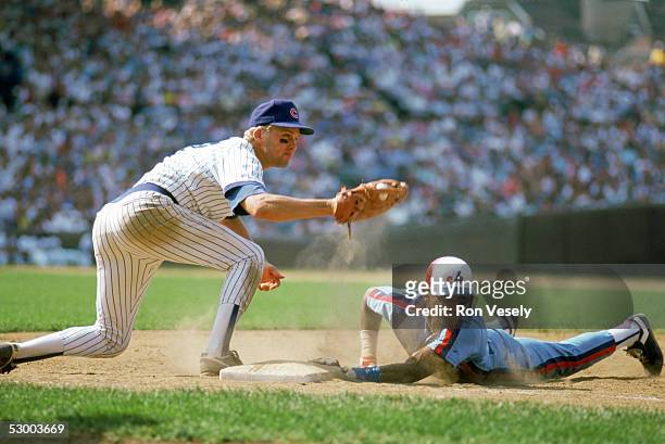 Mark Grace of the Chicago Cubs attempts to pick-off Otis Nixon of the Montreal Expos during a season game. Mark Grace played for the Chicago Cubs...