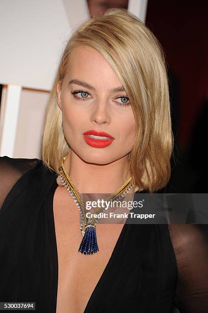 Actress Margot Robbie arrives at the 87th Academy Awards held at Hollywood & Highland Center in Hollywood.