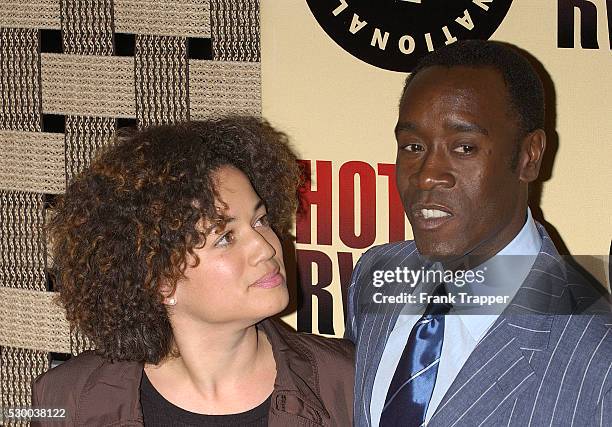 Co-star Don Cheadle and his wife arrive at the premiere of "Hotel Rwanda."