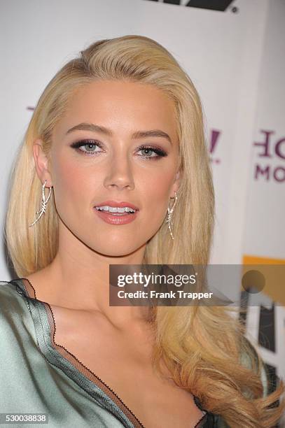 Actress Amber Heard arrives at the15th Annual Hollywood Film Awards Gala presented by Starz, held at the Beverly Hilton Hotel.