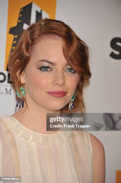Actress Emma Stone arrives at the15th Annual Hollywood Film Awards Gala presented by Starz, held at the Beverly Hilton Hotel.