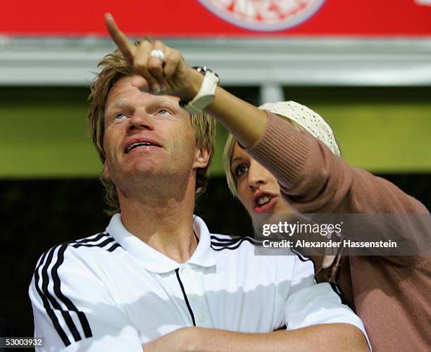 Munichs Soccerstar and Teamcaptain Oliver Kahn watch with girlfriend Verena Kerth the opening game of the Allianz Arena between Bayern Munich and...