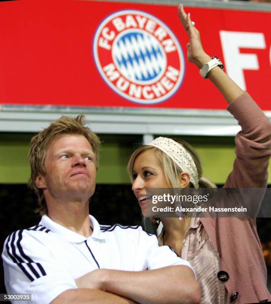 Munichs Soccerstar and Teamcaptain Oliver Kahn watch with girlfriend Verena Kerth the opening game of the Allianz Arena between Bayern Munich and...