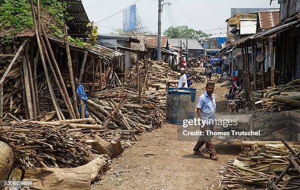 Mongla, Bangladesh View of a woodworking company on a dirt road on April 12, 2016 in Mongla, Bangladesh.