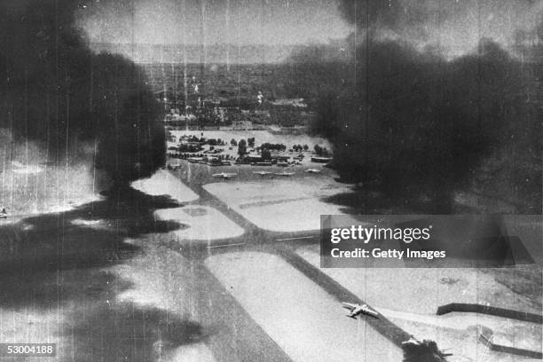 Smoke rises from destroyed Egyptian airplanes during an Israeli Air Force preemptive strike on June 5, 1967 against Egyptian airfields at the start...