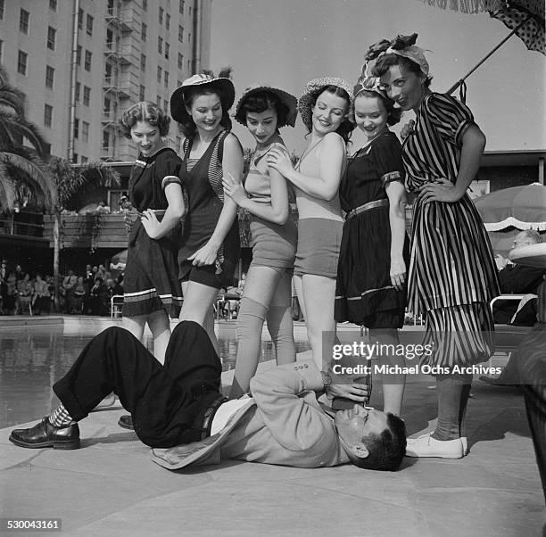 Sennett Bathing Beauties pose for a film camera in Los Angeles,CA.