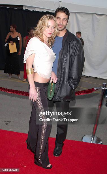 Actress Christina Applegate and husband, actor Jonathan Schaech, arrive at the 29th annual American Music Awards.