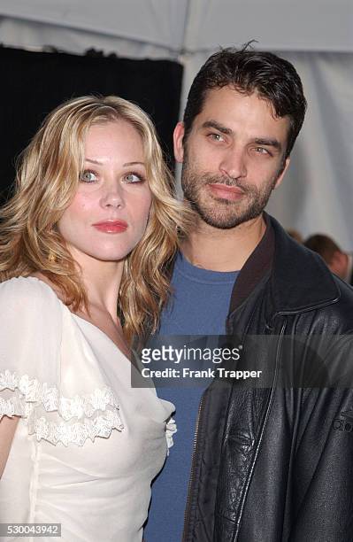 Actress Christina Applegate and husband, actor Jonathon Schaech, arrive at the 29th annual American Music Awards.