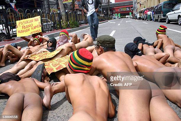 Militant university drop-outs hold s nude "die-in" protest in the 'University Belt", an area that hosts many educational institutes in Manila, 01...