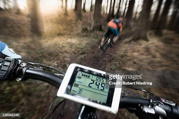 driving view of mountain biking down hill descending fast on bicycle, bavaria, germany - speed accuracy stock pictures, royalty-free photos & images