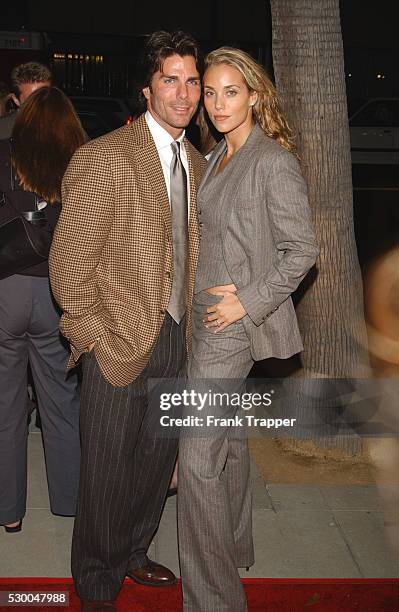 Elizabeth Berkley and Greg Lauren arriving at the premiere of "Moonlight Mile".