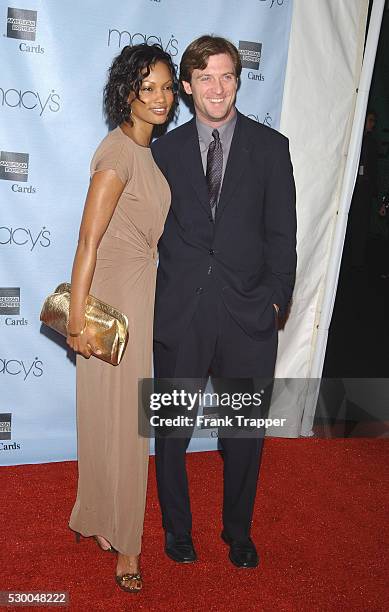 Garcelle Beauvais and husband: Michael Nilon arriving at "Macy's and American Express Passport 20/02."