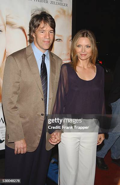Michelle Pfeiffer and David E. Kelley arriving at the premiere of "White Oleander."