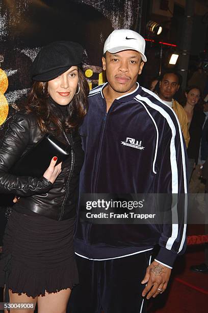 Dr. Dre and wife Nicole arriving at the premiere of "8 Mile."