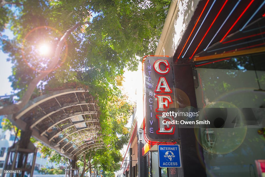 Low angle view of internet cafe sign on street, Santa Monica, Los Angeles, California, USA