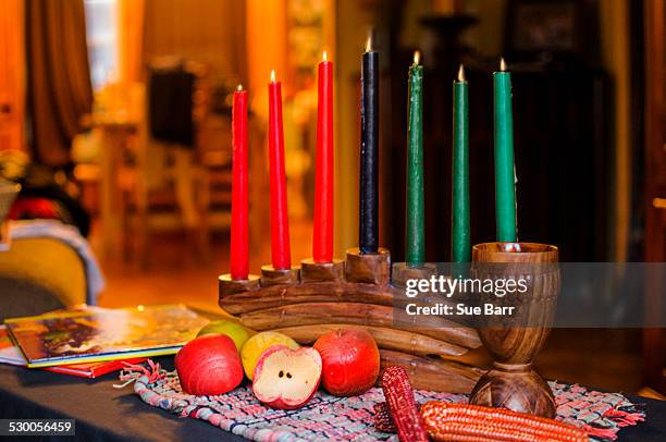 kinara candles for kwanzaa celebration - kwanzaa celebration stock pictures, royalty-free photos & images