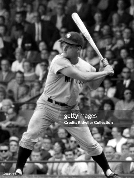 Outfielder Roger Maris of the New York Yankees strides into a pitch during a game on September 16, 1961 against the Detroit Tigers at Briggs Stadium...