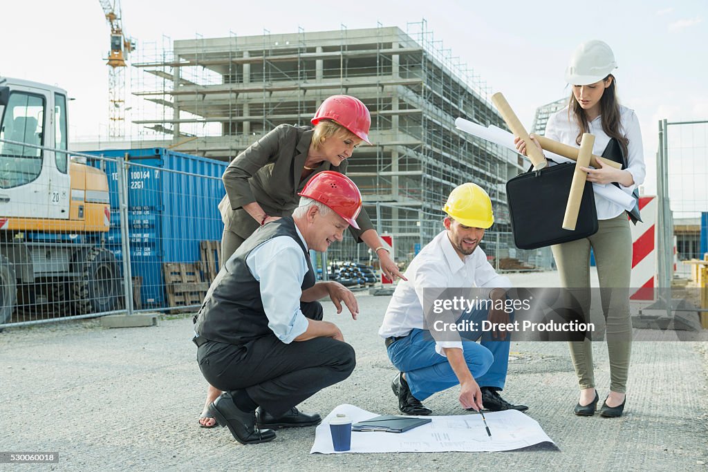 Architect discussing with customers