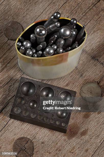 close-up of dapping blocks and punches in workshop, bavaria, germany - dapping up stock pictures, royalty-free photos & images