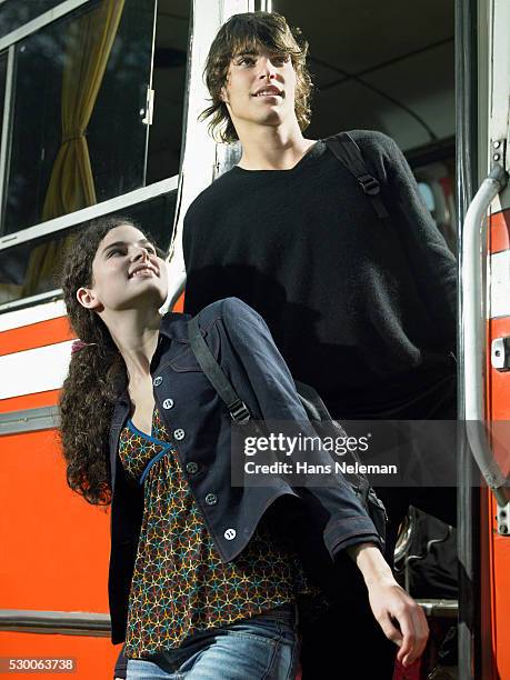 Getting Off Person Getting Off Bus Photos and Premium High Res Pictures - Getty Images