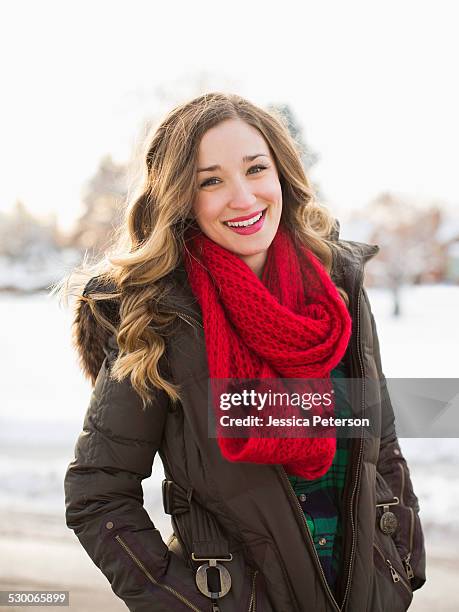 usa, utah, salt lake city, portrait of woman wearing red scarf smiling outdoors - composition stock pictures, royalty-free photos & images