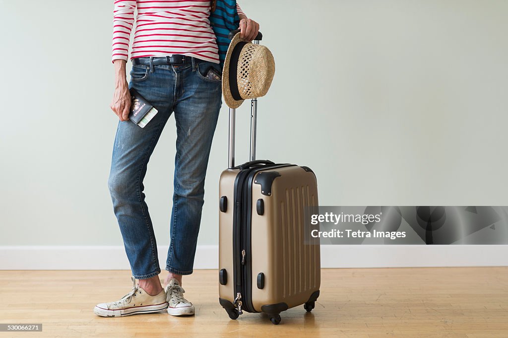 USA, New Jersey, Woman ready to go on vacations