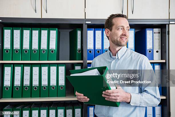 428 Man Filing Cabinet Stock Photos, High-Res Pictures, and Images ...