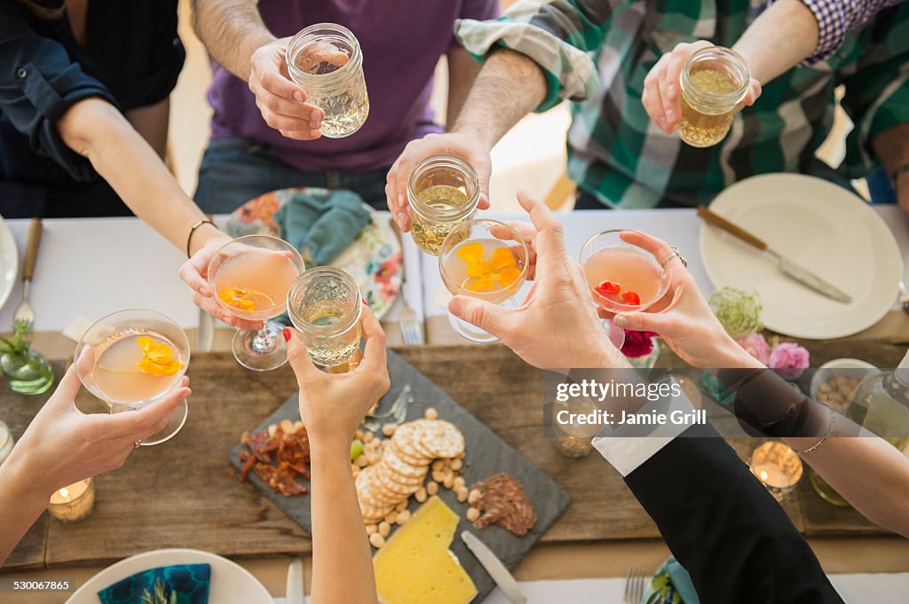 USA, New Jersey, Jersey City, People toasting at party