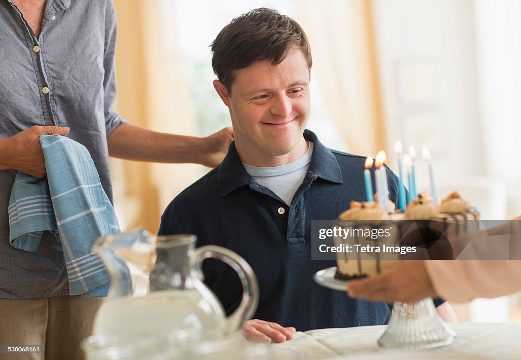 USA, New Jersey, Man with down syndrome celebrating birthday