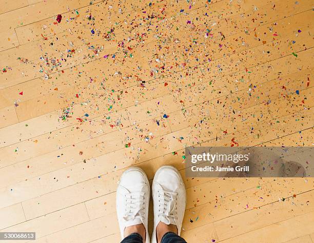 usa, new jersey, jersey city, woman's feet and confetti on floor - looking down at shoes stock pictures, royalty-free photos & images