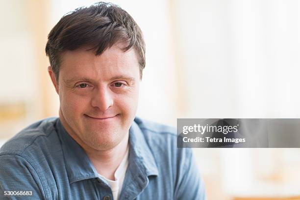 Downs Syndrome Man Photos And Premium High Res Pictures Getty Images downs-syndrome-man-photos-and-premium-high-res-pictures-getty-images