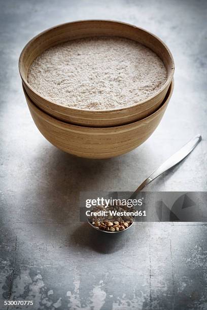 bowl of buckwheat flour and a spoon of buckwheat grains - buckwheat ストックフォトと画像