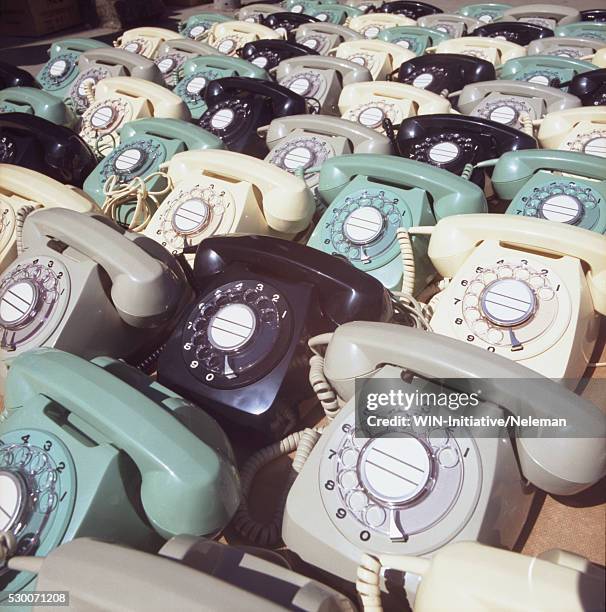 rotary phones in a storage room of a telephone company - teléfono con cable fotografías e imágenes de stock