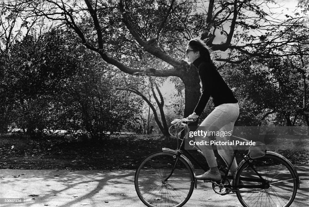 Jackie Kennedy Onassis Riding Bicycle