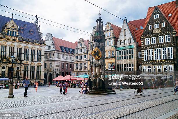 germany, bremen, statue of roland on market square - bremen stock pictures, royalty-free photos & images