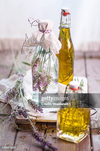 lavender vinegar, rosemary oil and thyme oil - white vinegar stock pictures, royalty-free photos & images