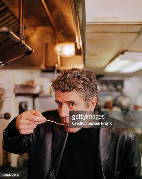 Chef Anthony Bourdain is photographed in June 2003 tasting food at the Brasserie Les Halles on Park Avenue in New York City.