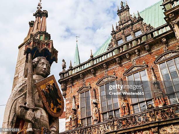 germany, bremen, statue of roland and town hall - bremen stock pictures, royalty-free photos & images