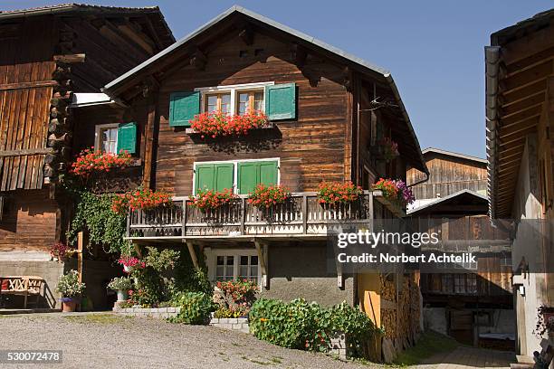 log cabins in a village, vrin, switzerland - mountain village stock pictures, royalty-free photos & images