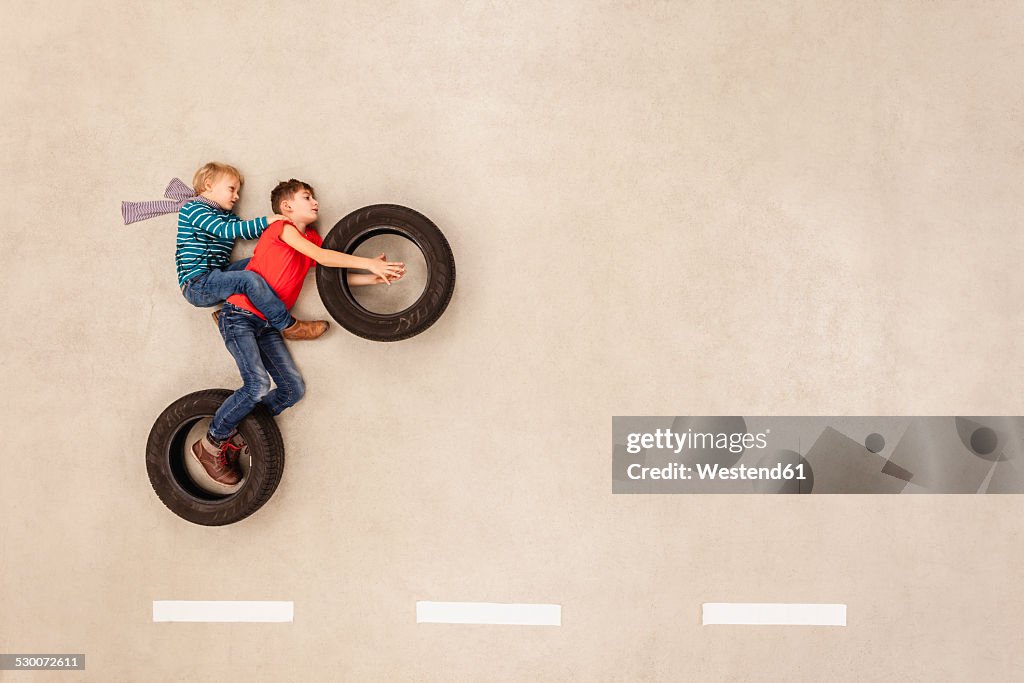 Bikers pulling a wheelie