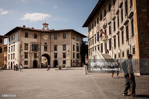 italy, tuscany, pisa, palazzo dell'orologio and palazzo della carovana on knights' square - pisa italy stock pictures, royalty-free photos & images