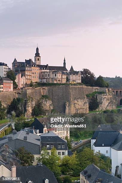 luxembourg, luxembourg city, view to the city district grund, saint michael's church in the background, morning light - kirchberg luxembourg stock pictures, royalty-free photos & images