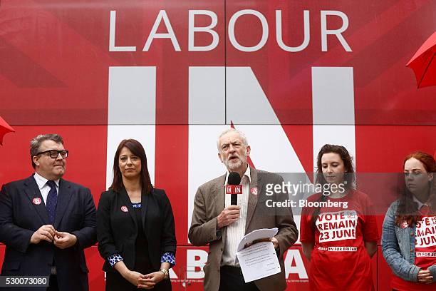Jeremy Corbyn, leader of the U.K. Opposition Labour Party, center, speaks as Tom Watson, deputy leader of the U.K. Opposition Labour Party, left, and...
